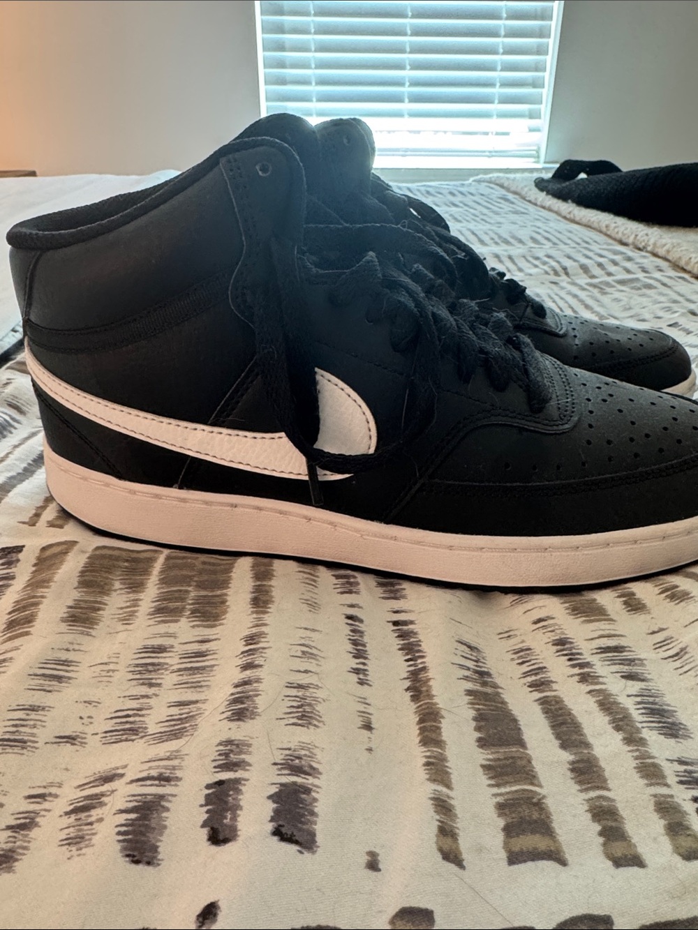 Nike Black and White Mid-Top Sneakers